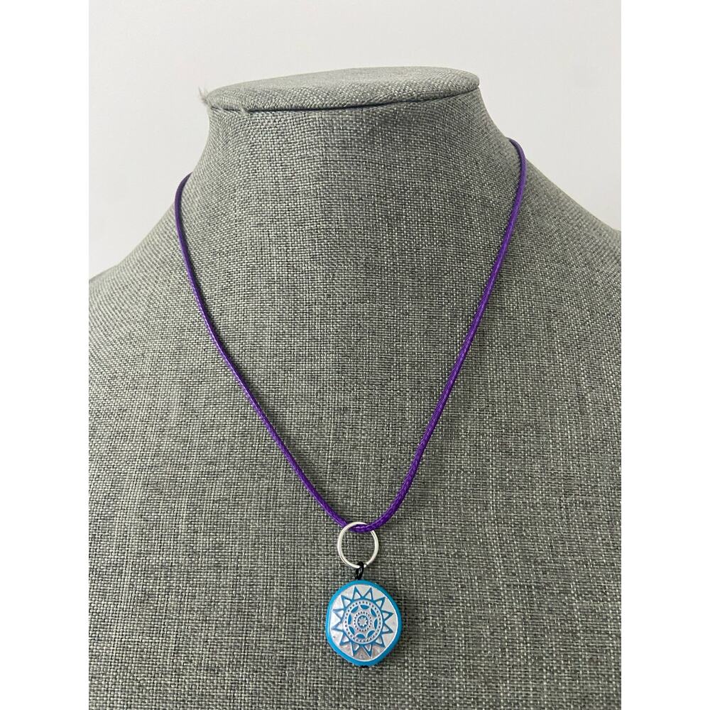 Blue sun pendant necklace